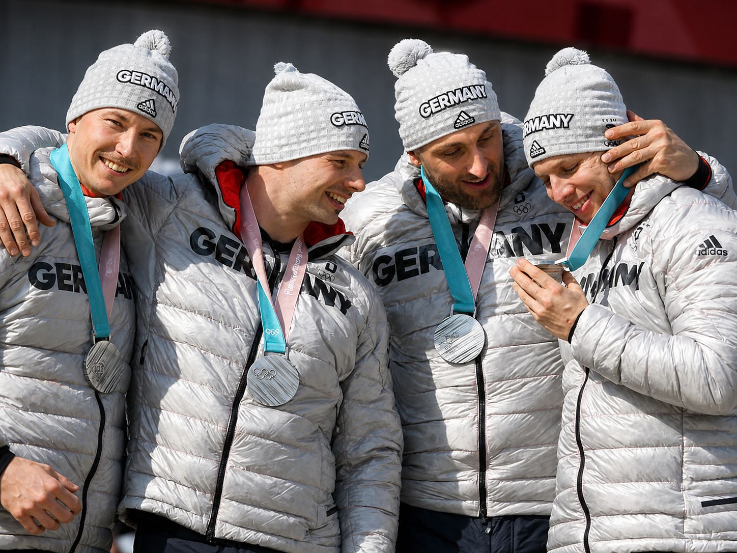 Walther, Kuske, Rödiger and Franke on the podium with their silver medals, PyeongChang 2018